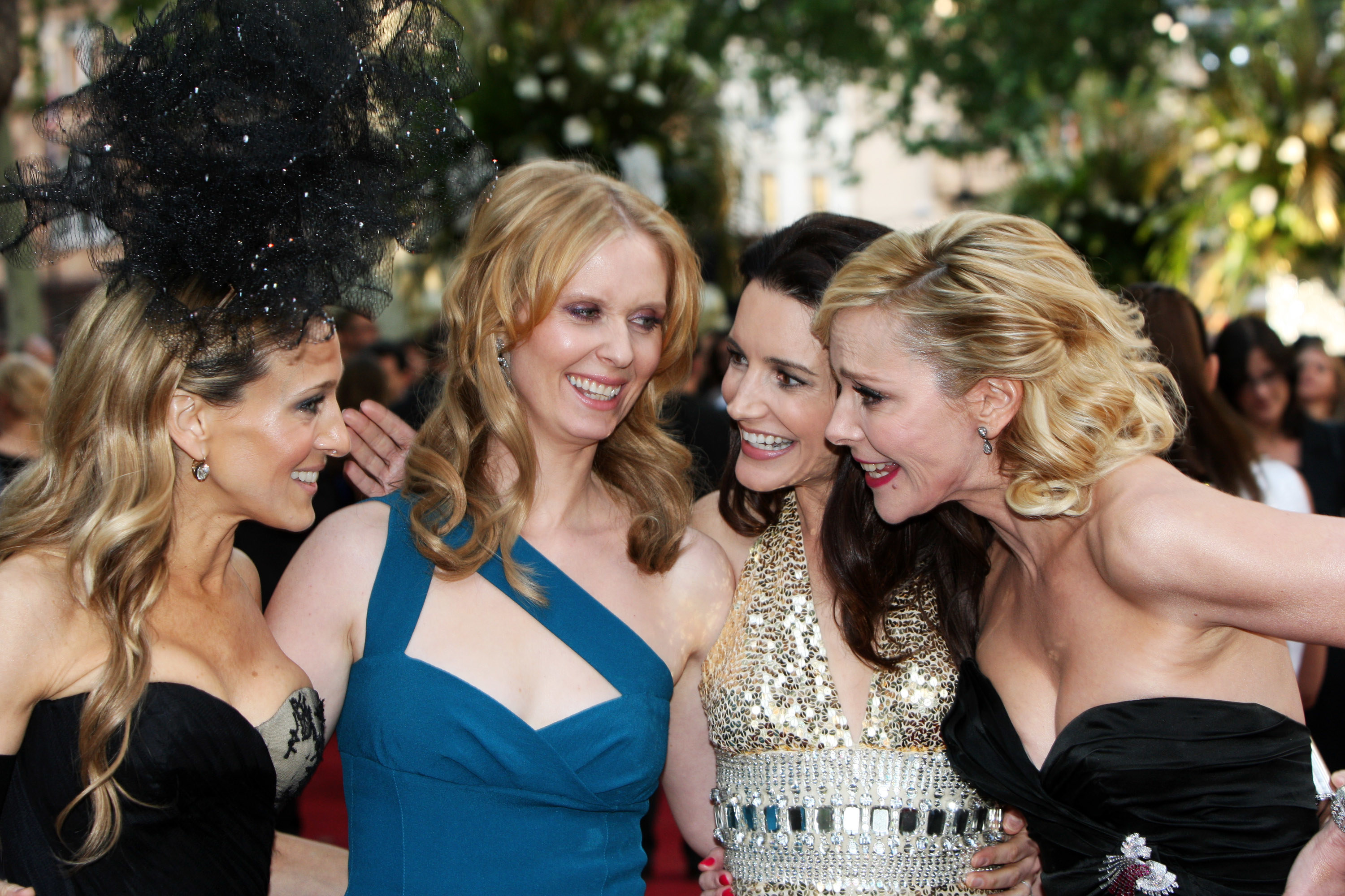 The four SATC leads smiling together