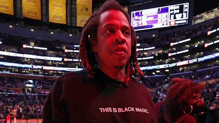 jay z is seen at a game