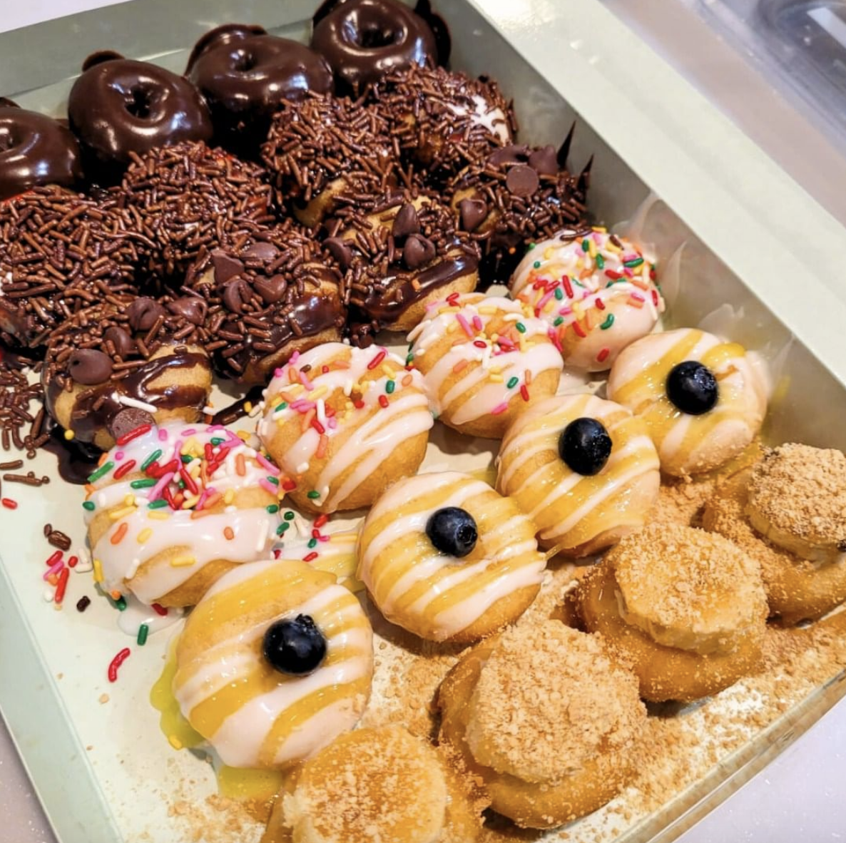 a row of decorated donuts