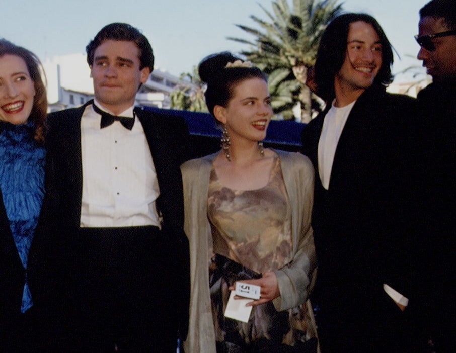 A closeup of Kate, Robert and Keanu at the event and Kate can be seen holding her torso