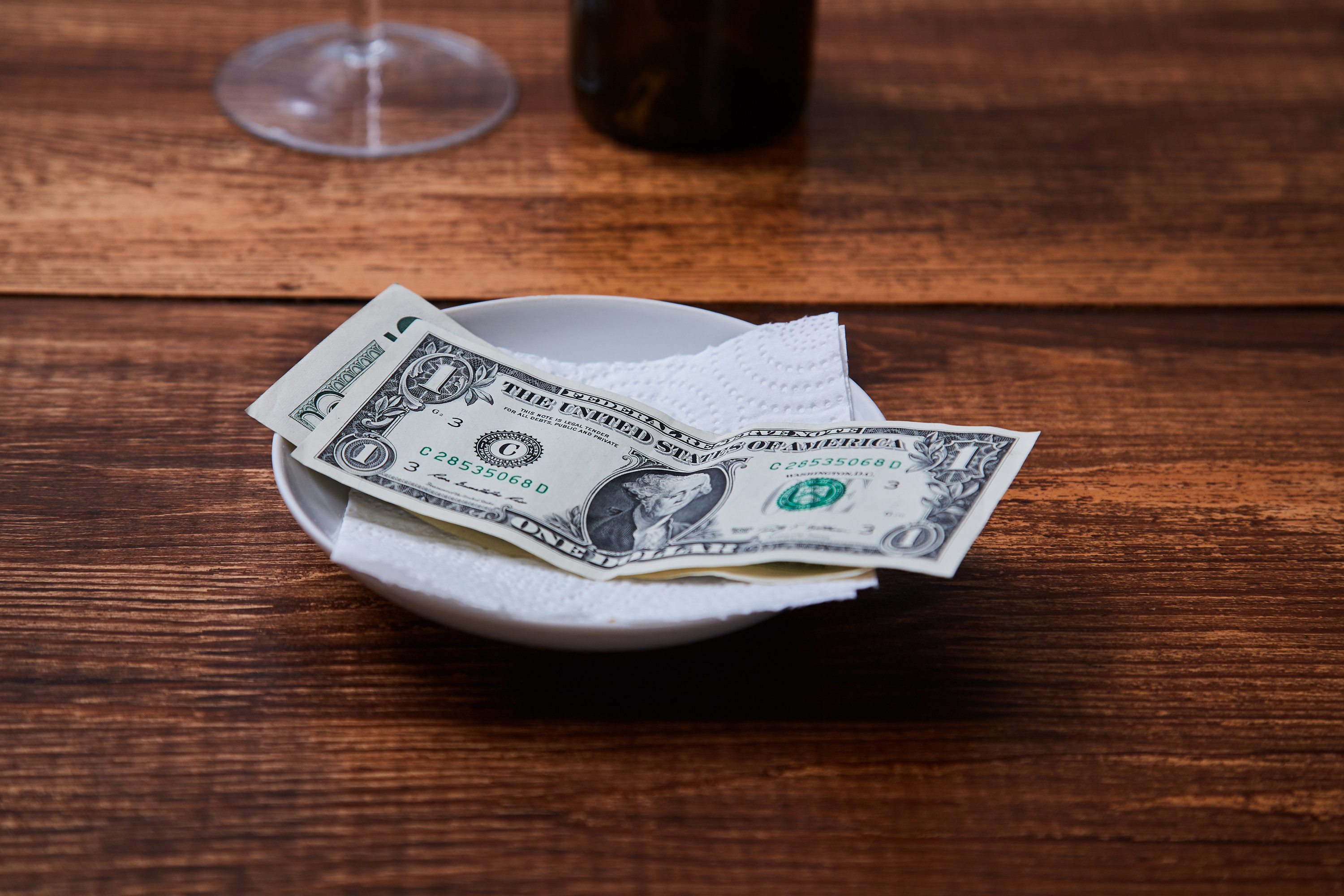 Cash tip on a restaurant table
