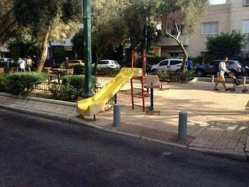 A slide that ends in a street