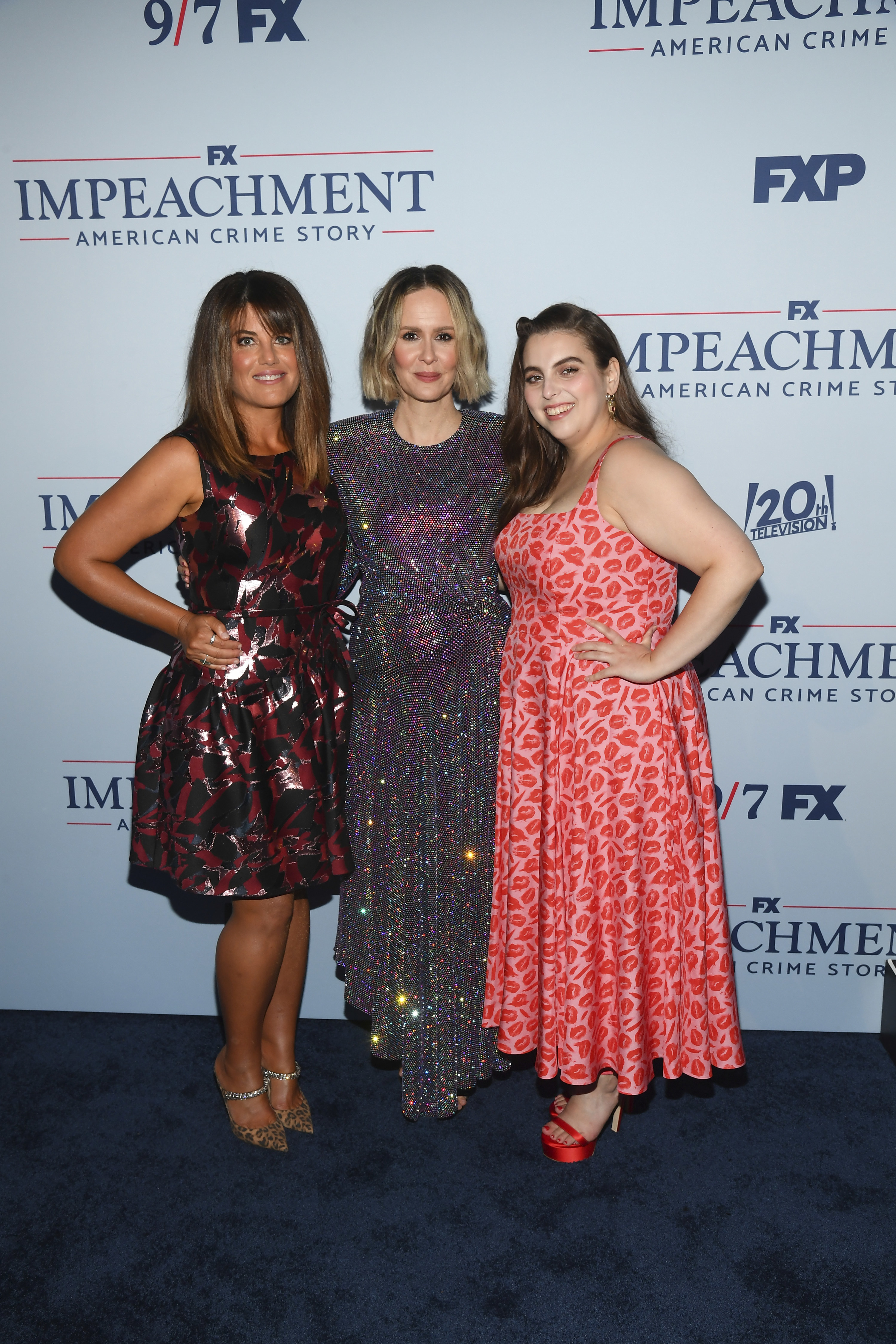 From left to right to left: The real Monica Lewinsky, Sarah Paulson, and Beanie smile for a group photo at a red carpet event
