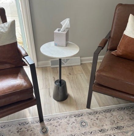 the round pedestal table with a thin base