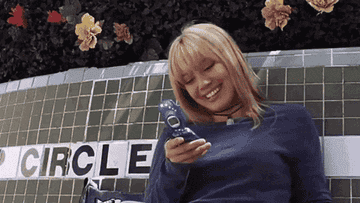 hilary duff in &quot;a cinderella story&quot; texts &#x27;have fun at edc :)&#x27;