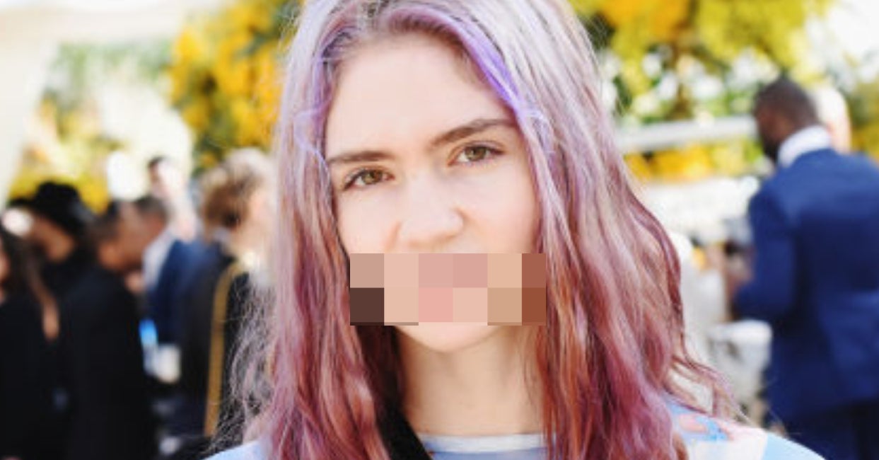 Grimes Debuts Her Chipped Front Tooth