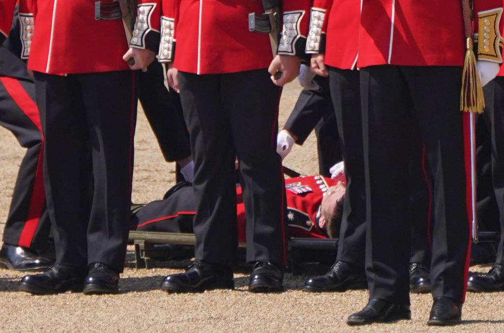A member of the Band of the Welsh Guards laying on the ground