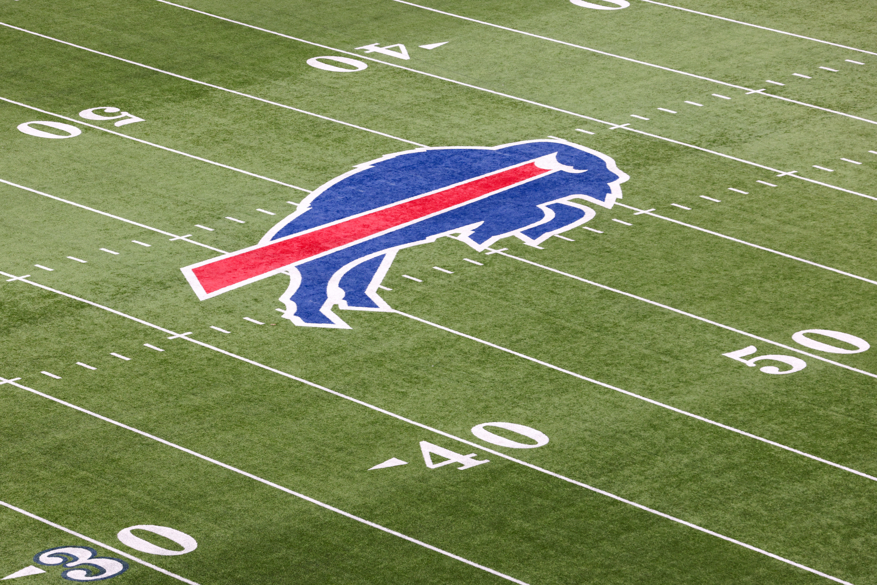 The Buffalo Bills logo is seen on the field prior to a game against the Cincinnati Bengals in the AFC Divisional Playoff game at Highmark Stadium on January 22, 2023 in Orchard Park, New York