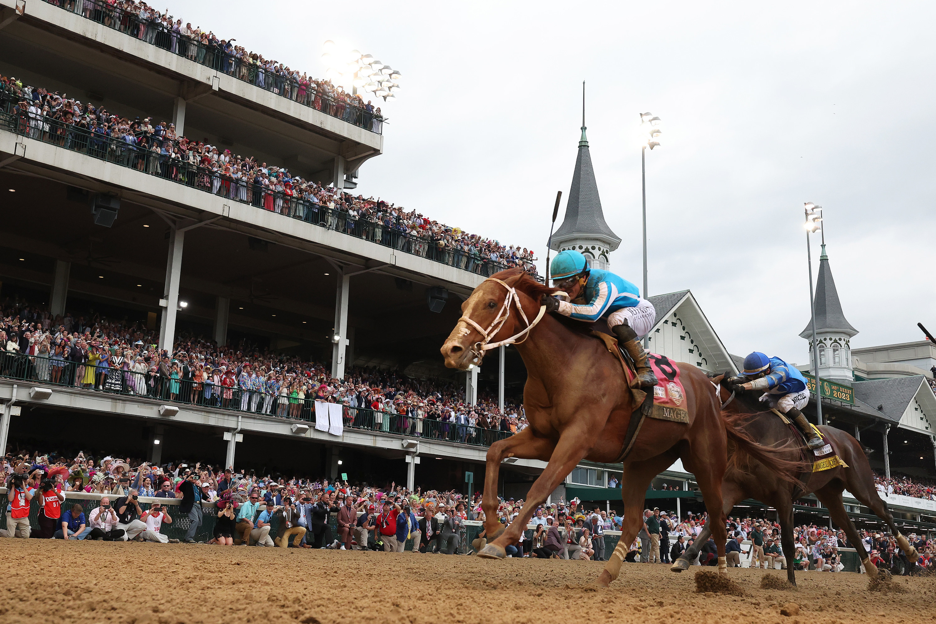 Mage #8, ridden by jockey Javier Castellano crosses the finish line to win the 149th running of the Kentucky Derby at Churchill Downs on May 06, 2023 in Louisville, Kentucky