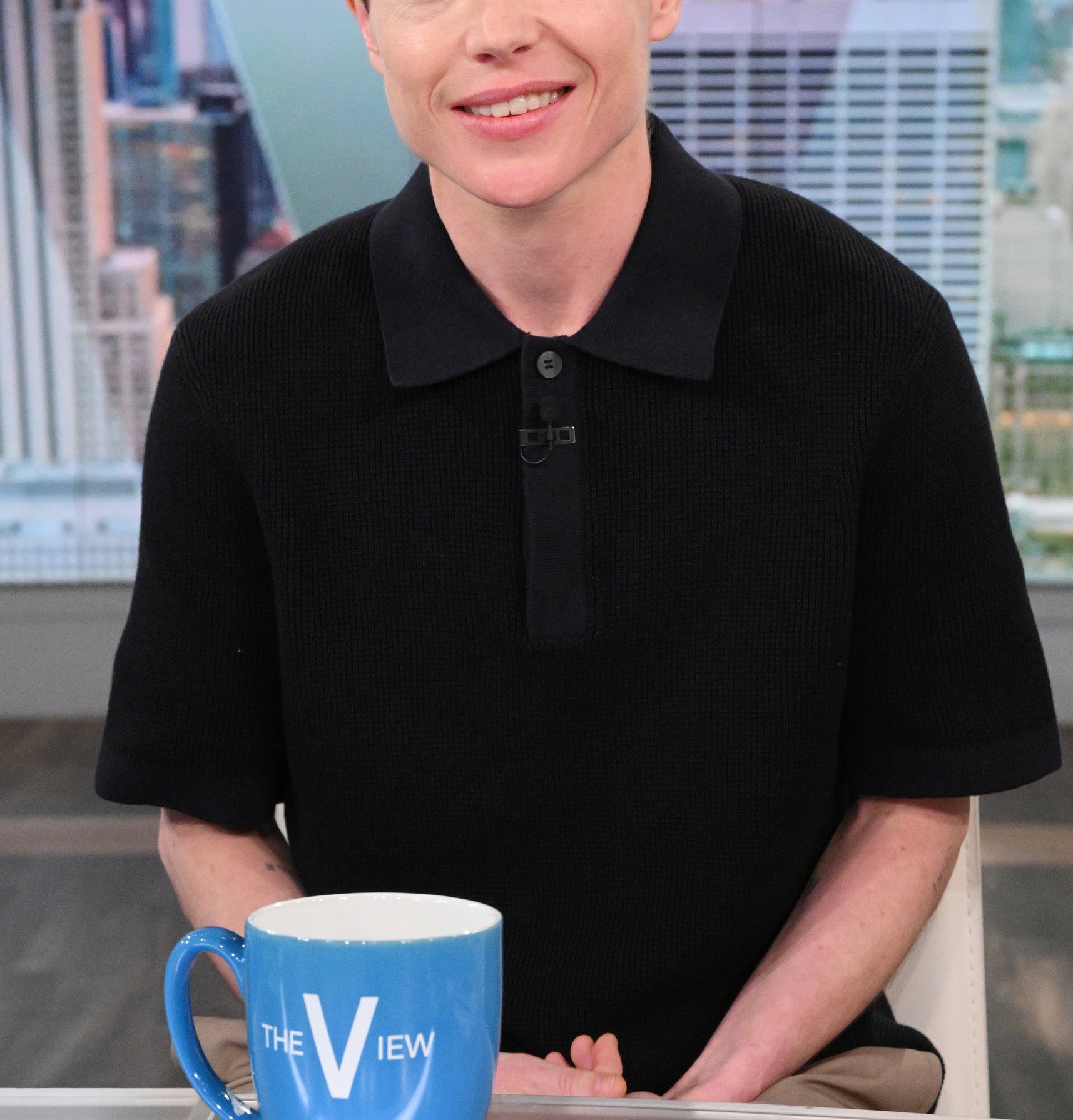 Close-up of Elliot smiling on the set of The View