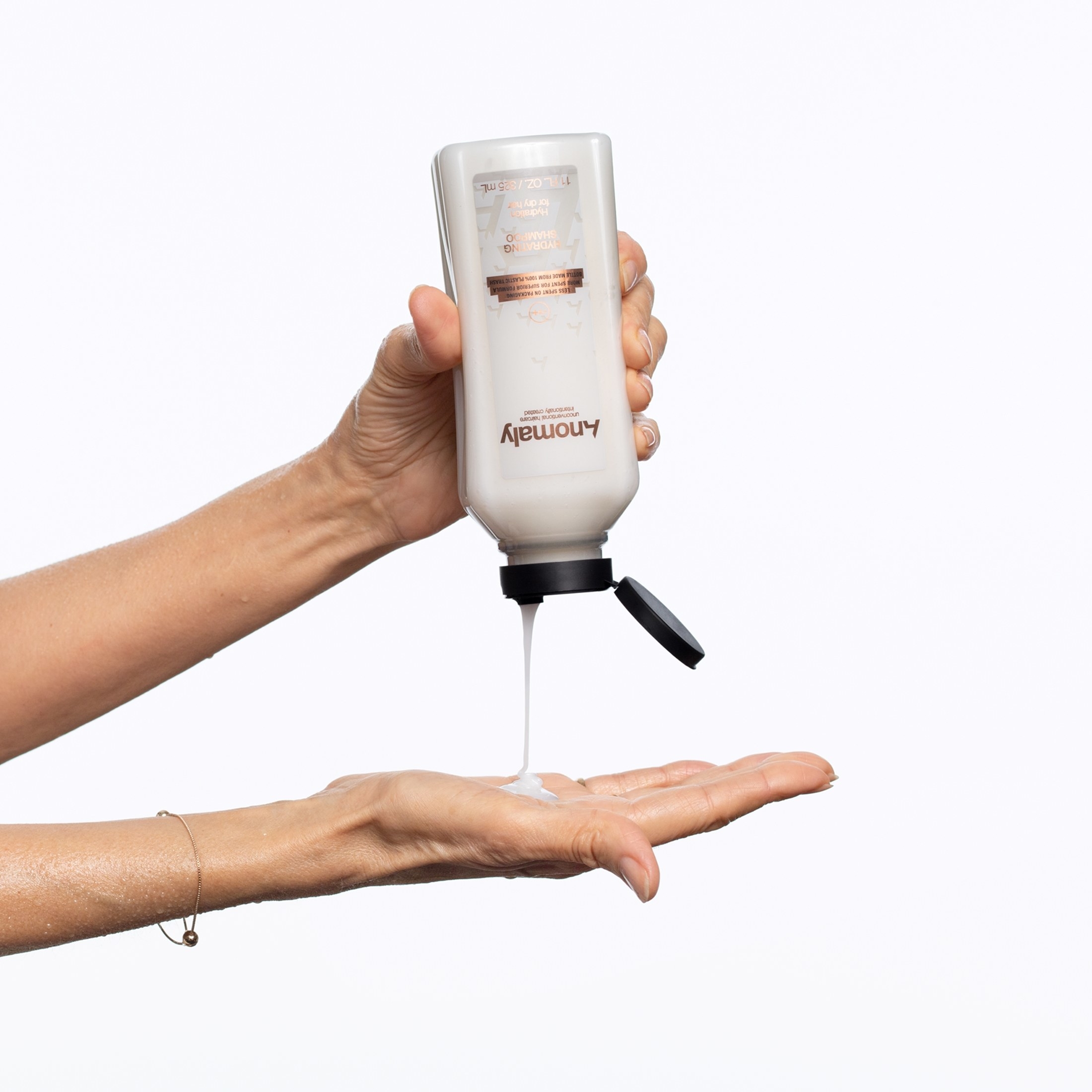 A model pouring the product in their hand