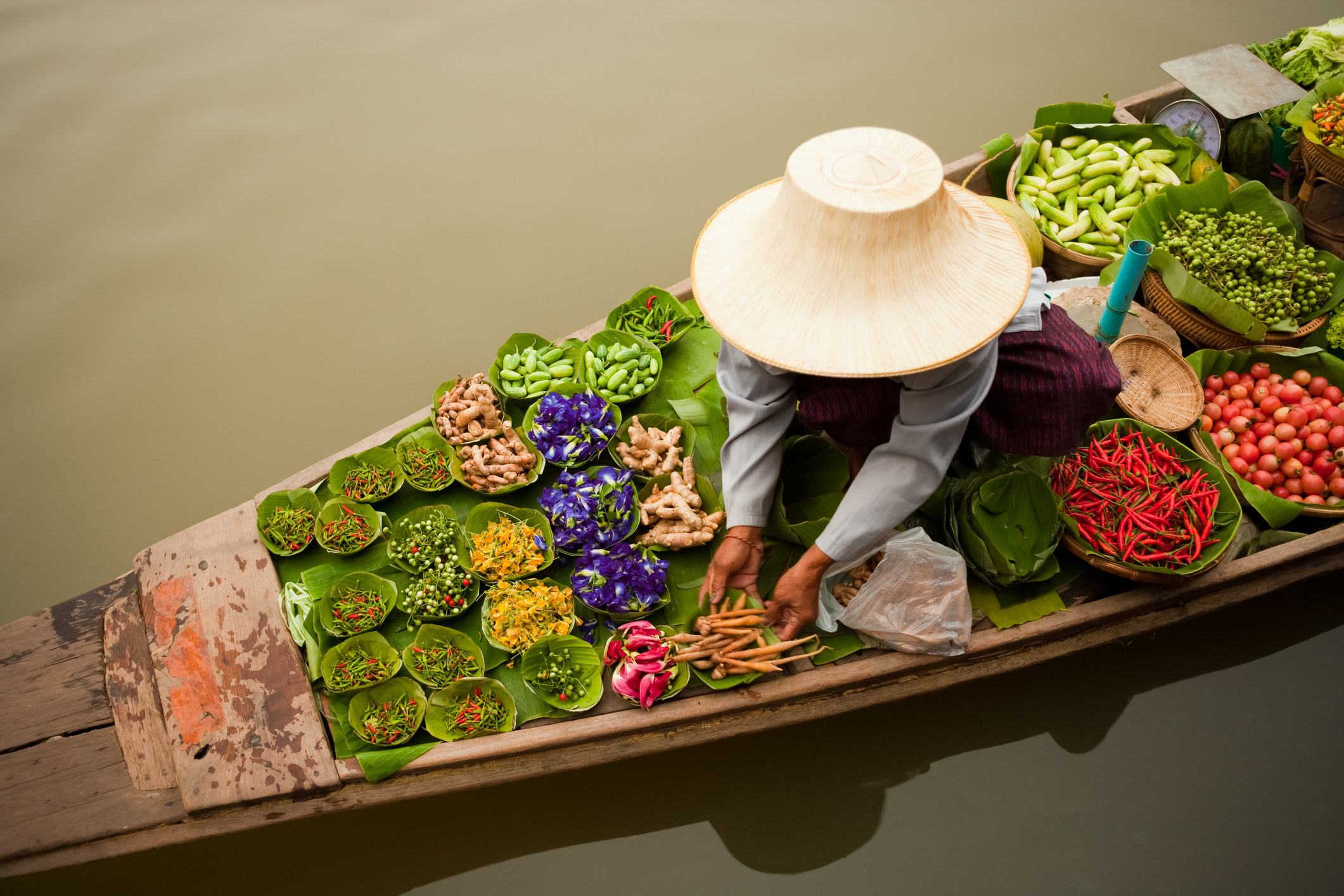 A floating market on a small boat in Bangkok