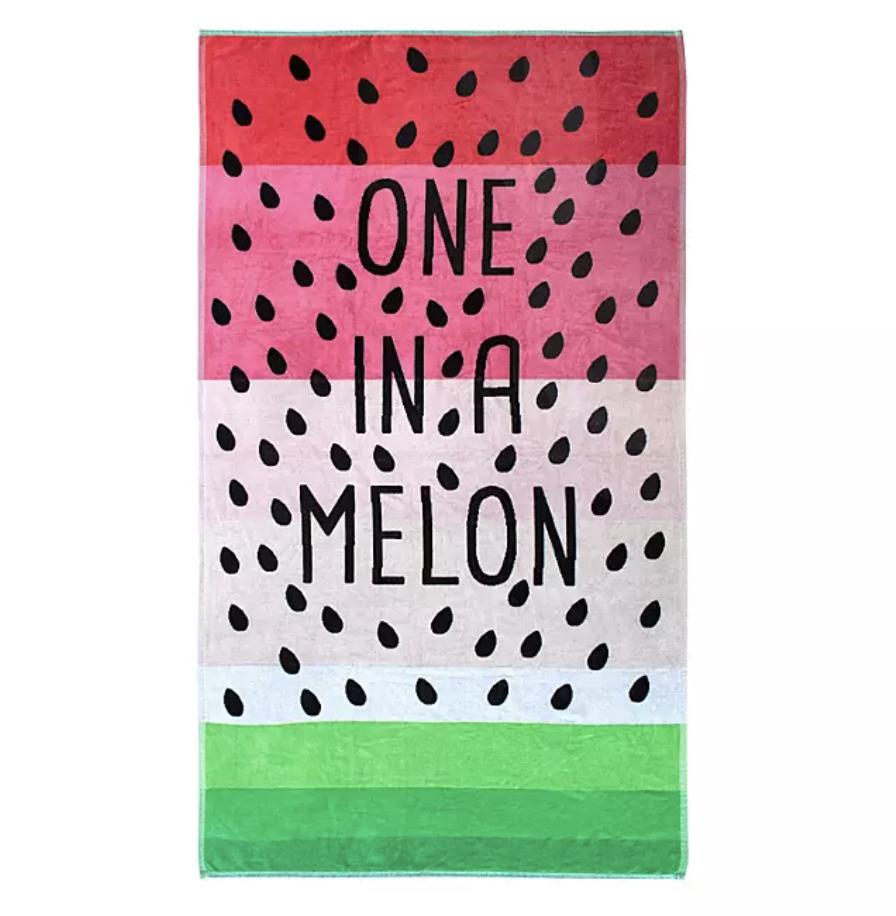 a watermelon beach towel reading &quot;one in a melon&quot;
