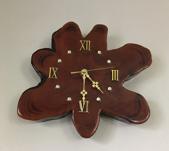 A wooden wall clock