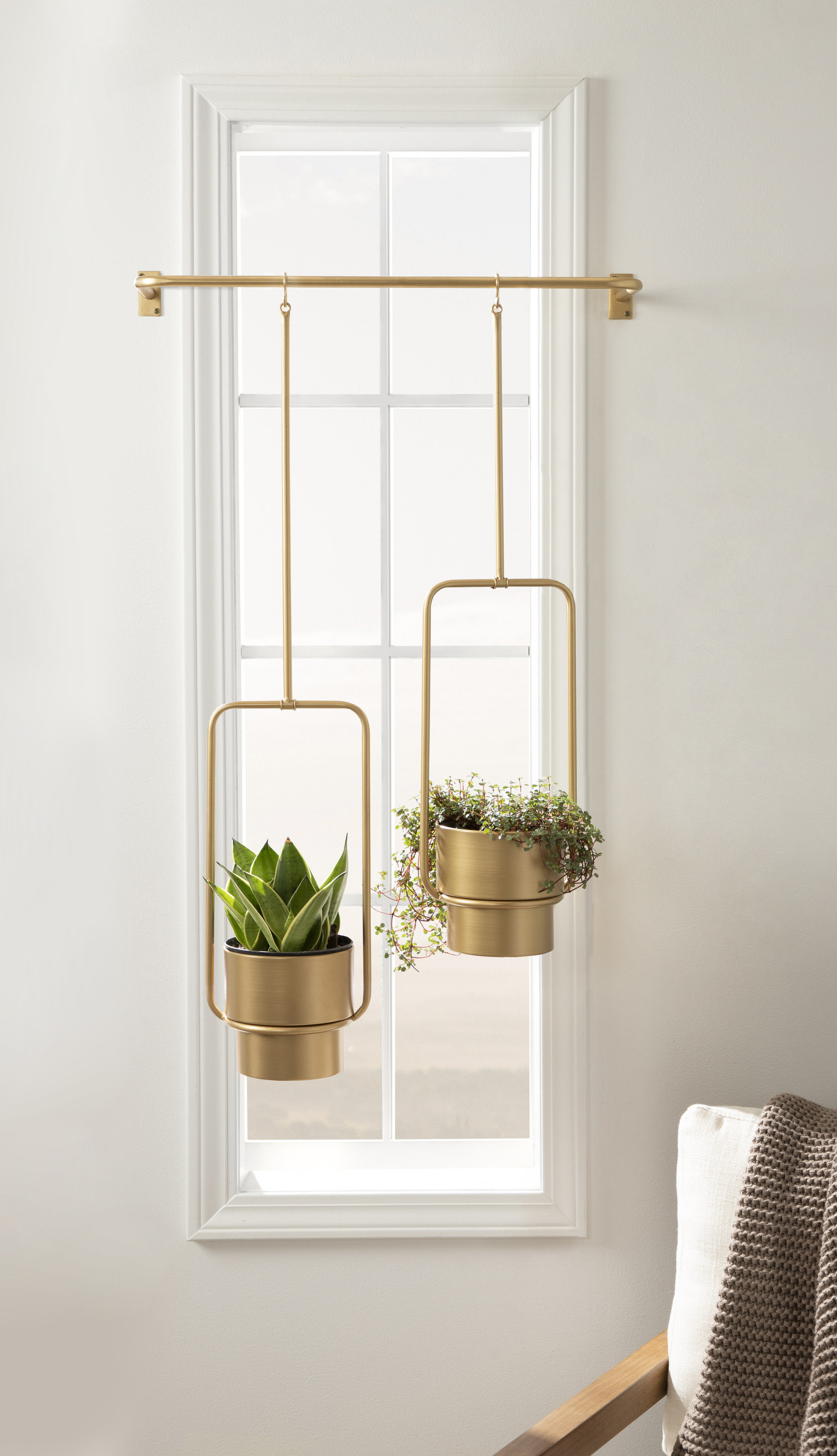 The planters hanging from a window