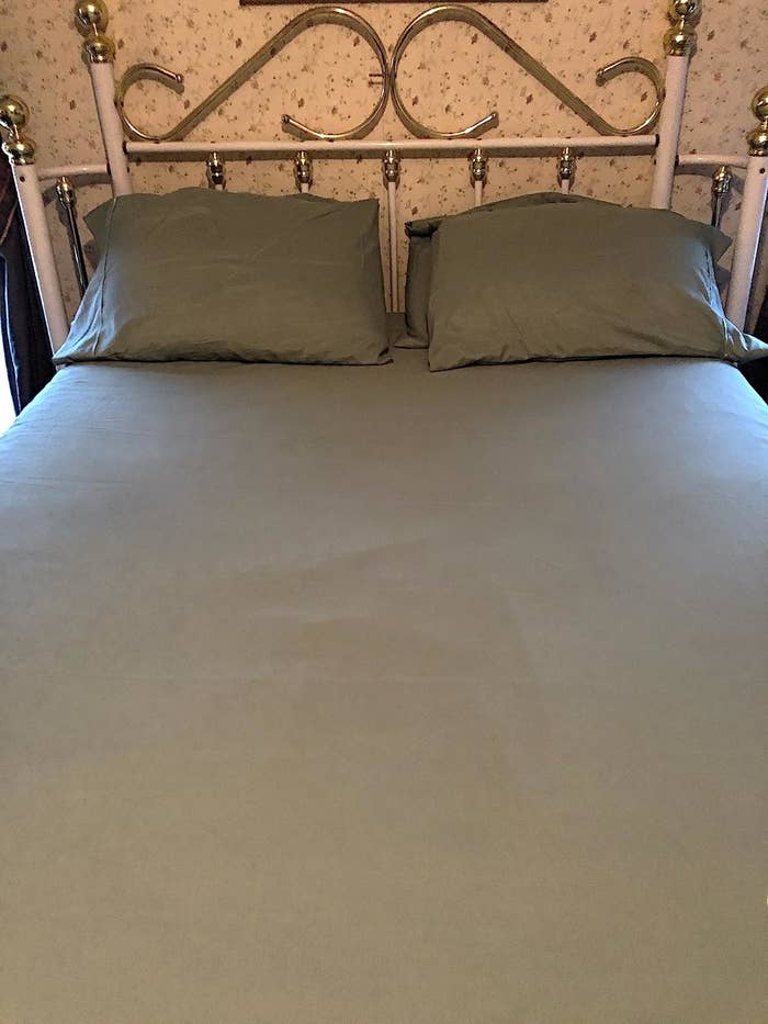 Reviewer&#x27;s bed with grey sheets