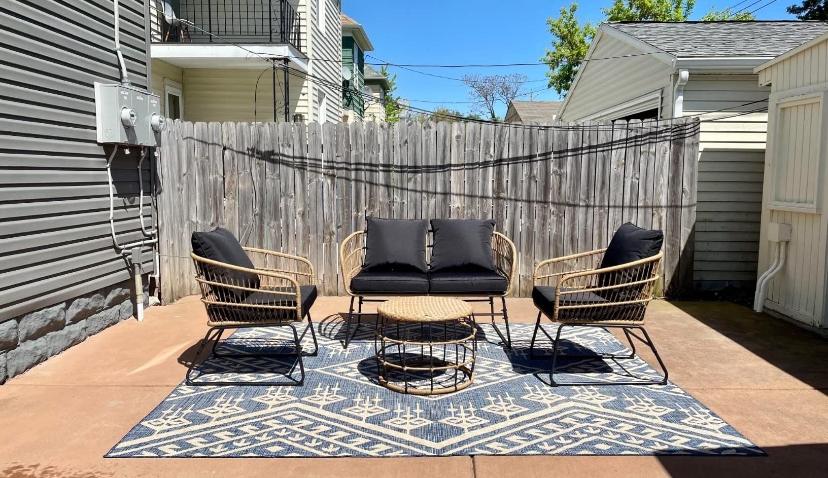the four-piece black patio set