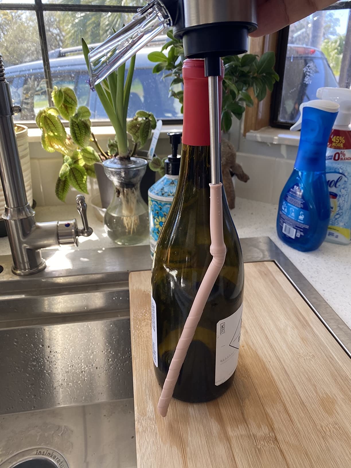 The wine aerator in a bottle of red wine
