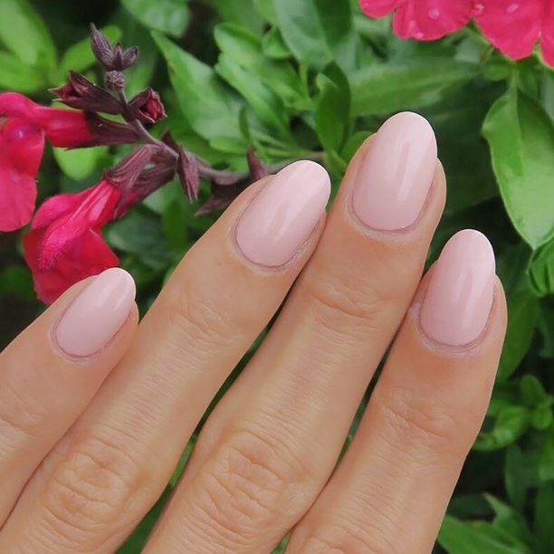 A model using the nude polish on their nails