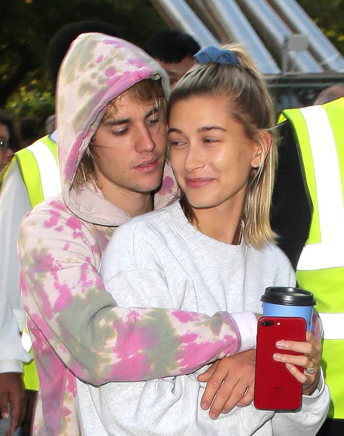 justin hugging hailey from behind