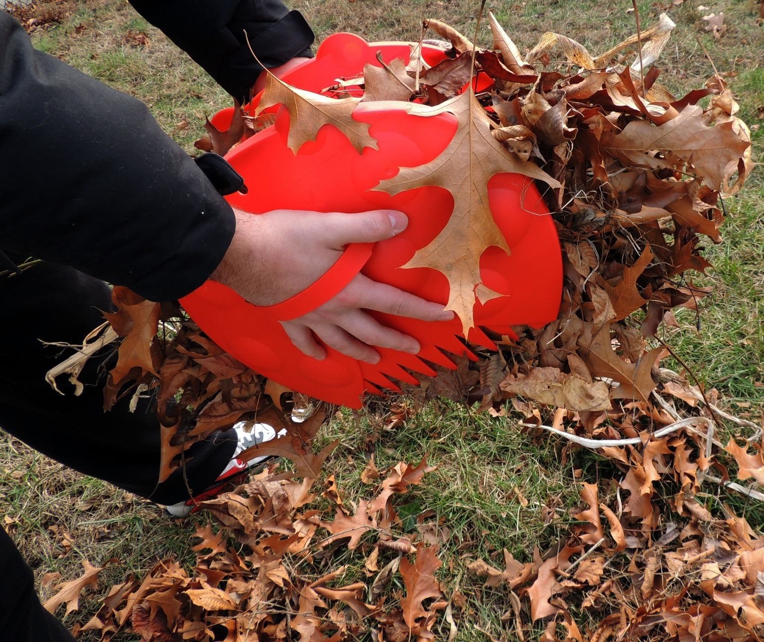 Reviewer&#x27;s photo of the leaf grabbers in use in the color Red