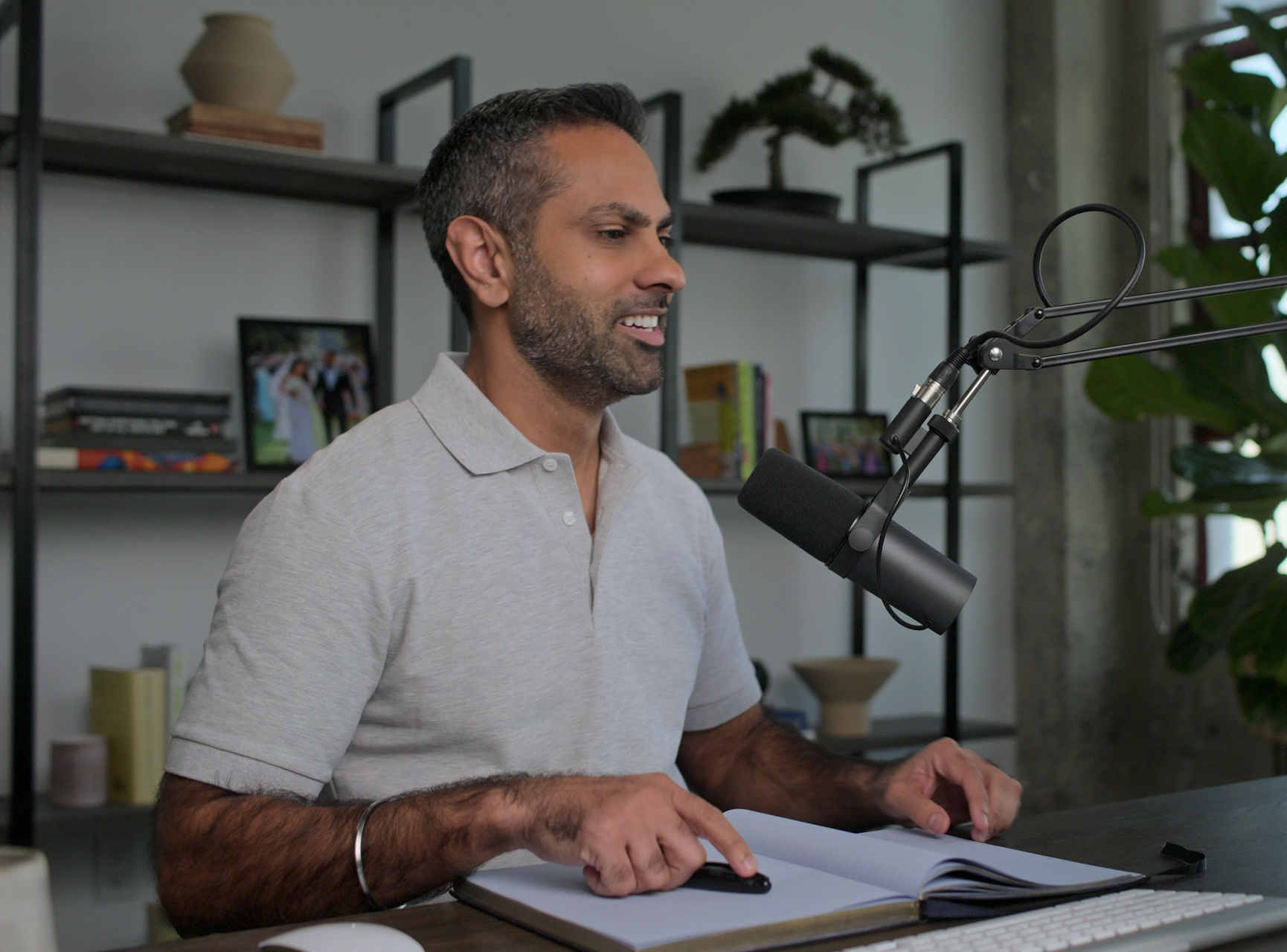 a man talking into a mic