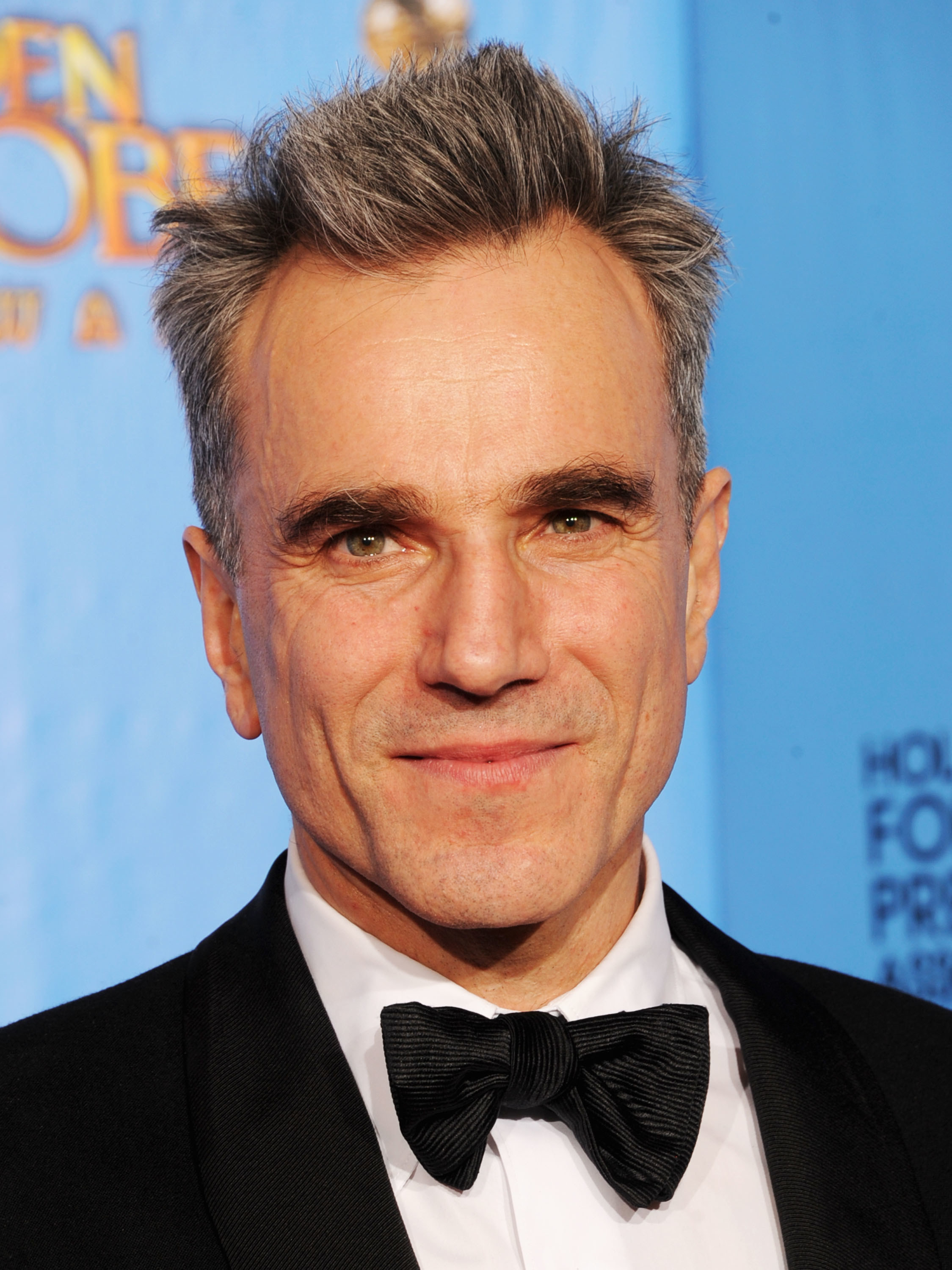 Daniel Day Lewis smiling on a red carpet