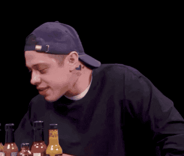 pete davidson on hot ones with tears in his eyes from the spiciness