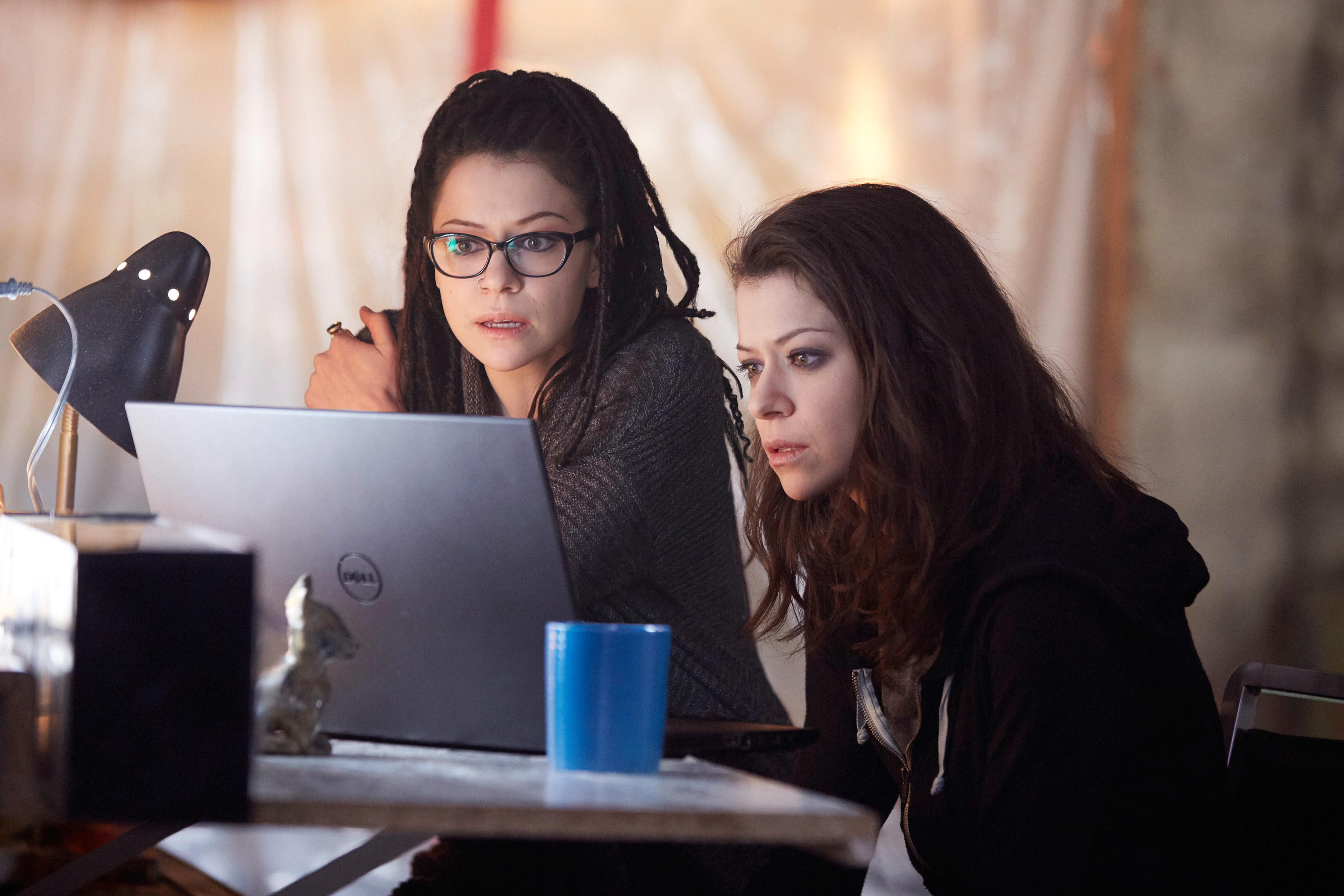 two of the clones looking at a computer