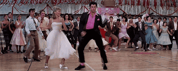 Students dancing at prom in the movie "Greece."