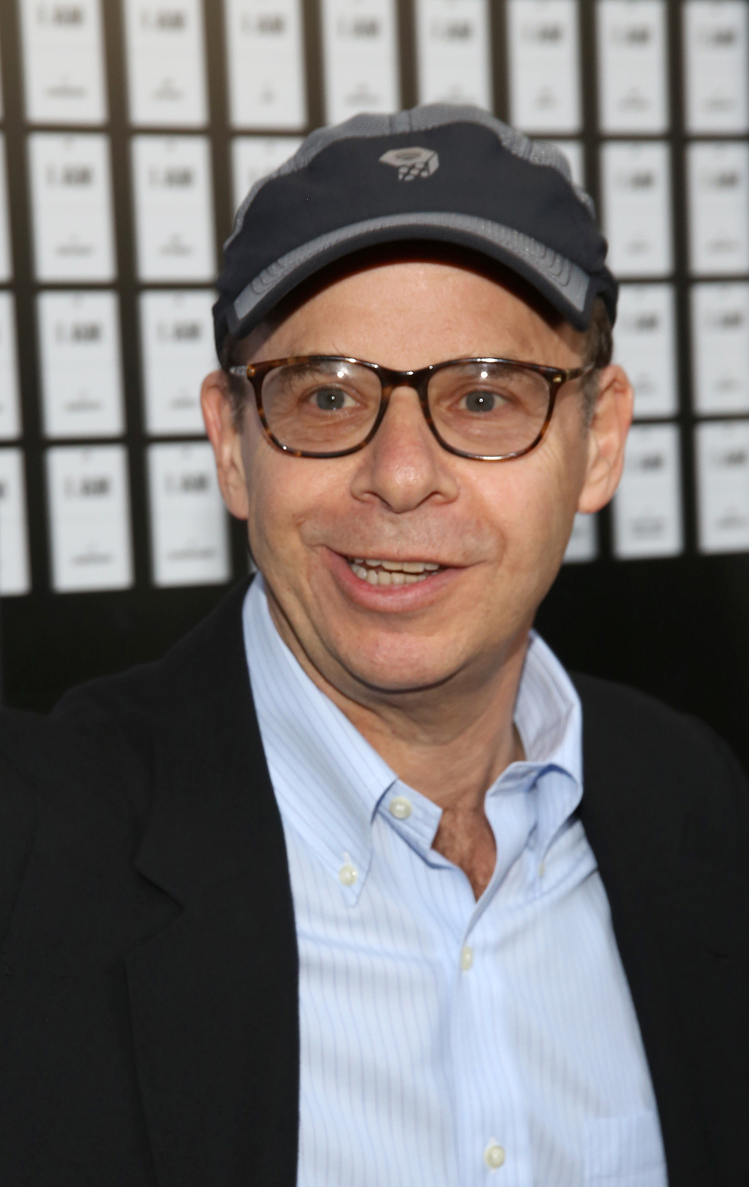 Rick Moranis smiling