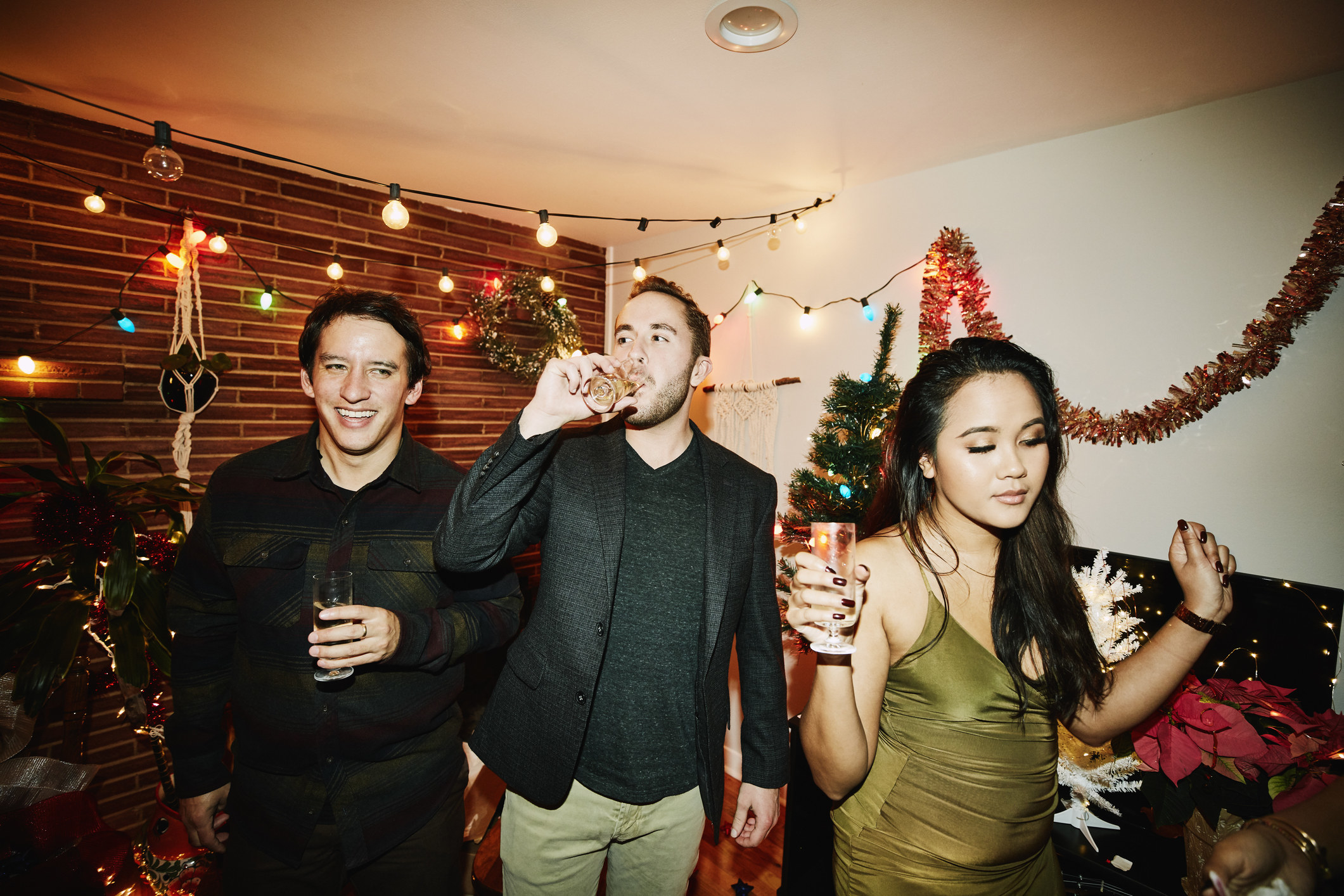 People drinking at a Christmas party