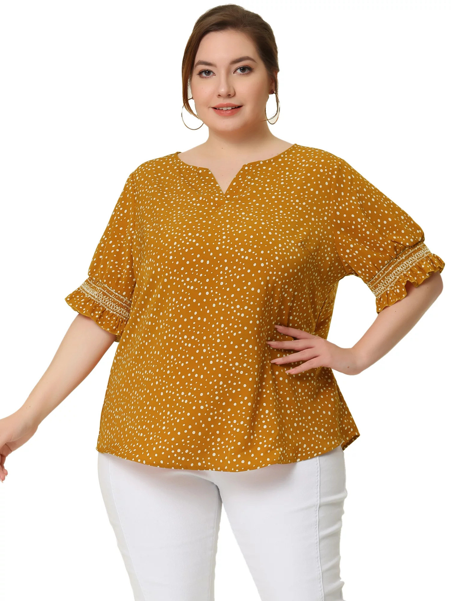 Model wearing the yellow dotted blouse