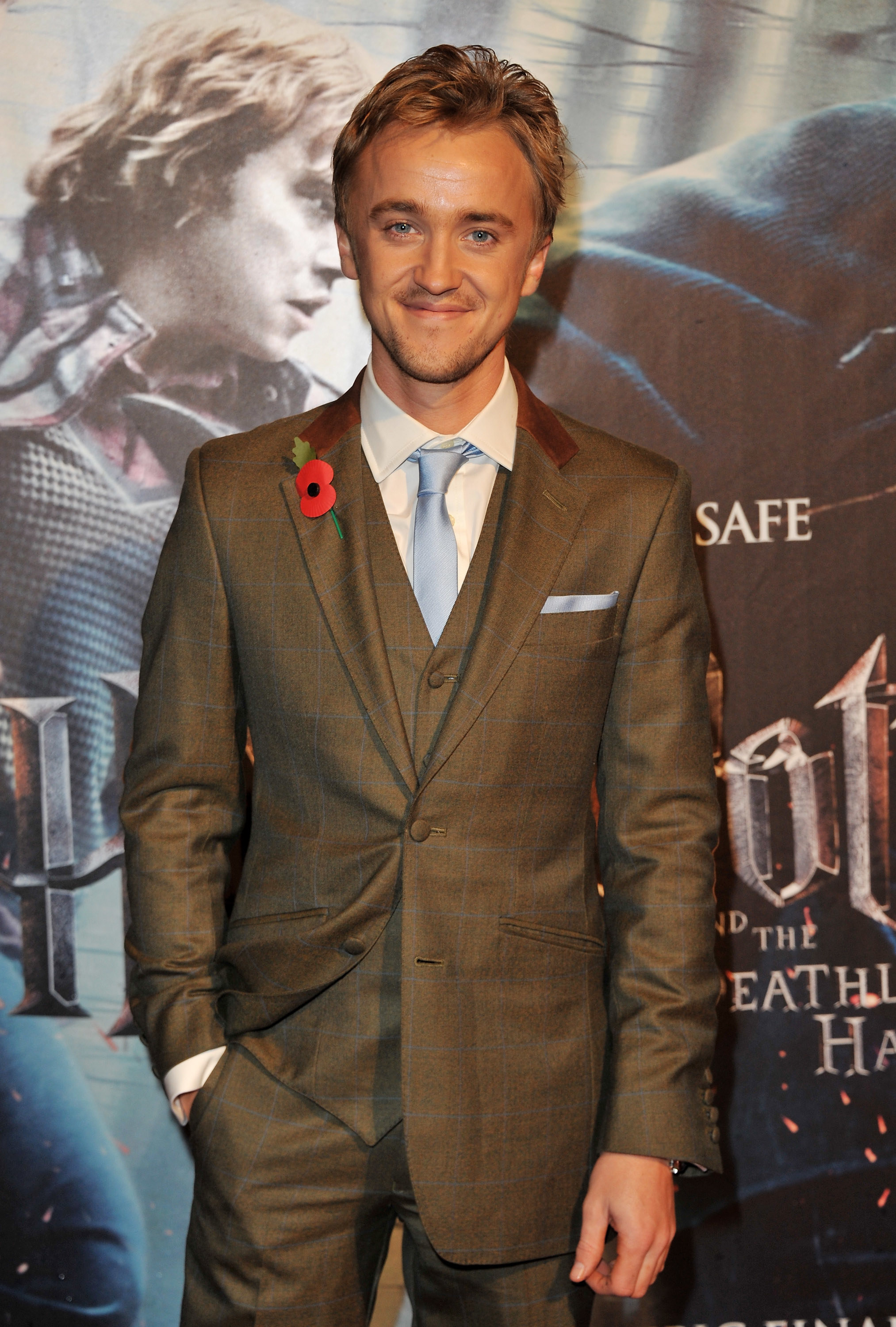 him in a suit for a harry potter event
