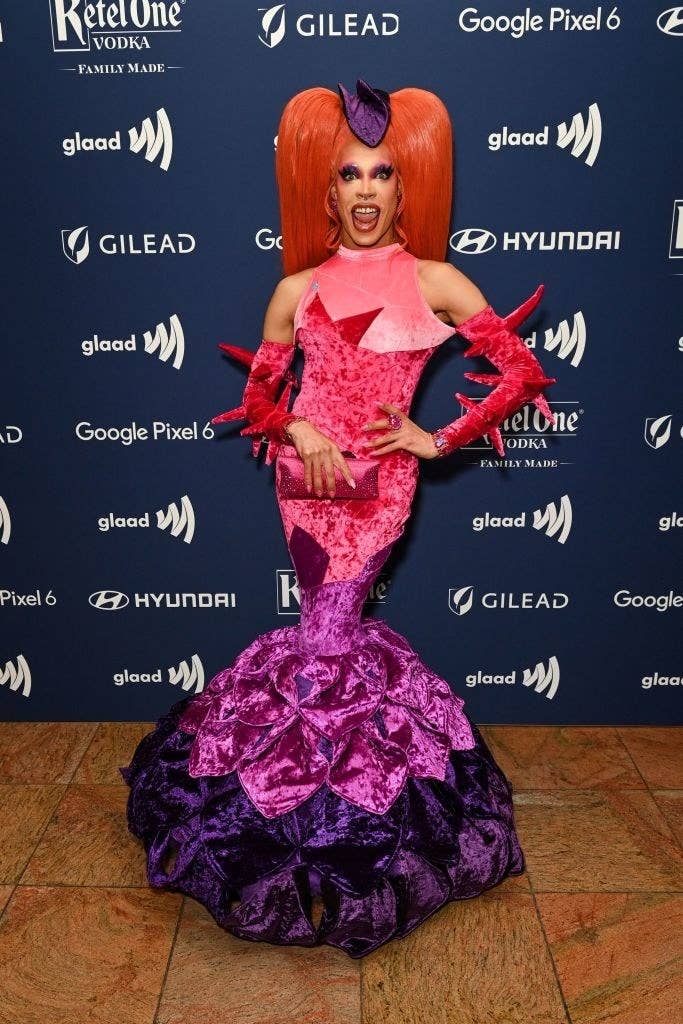Yvie at a glaad event wearing a mermaid style dress
