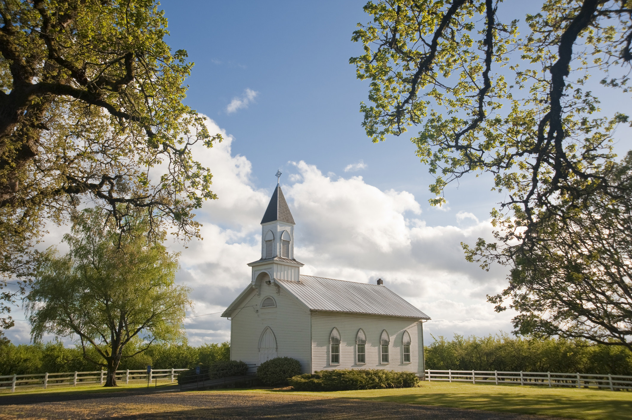 Old clapboard white rural church.