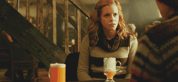 Hermoine Granger drinking butter beer.