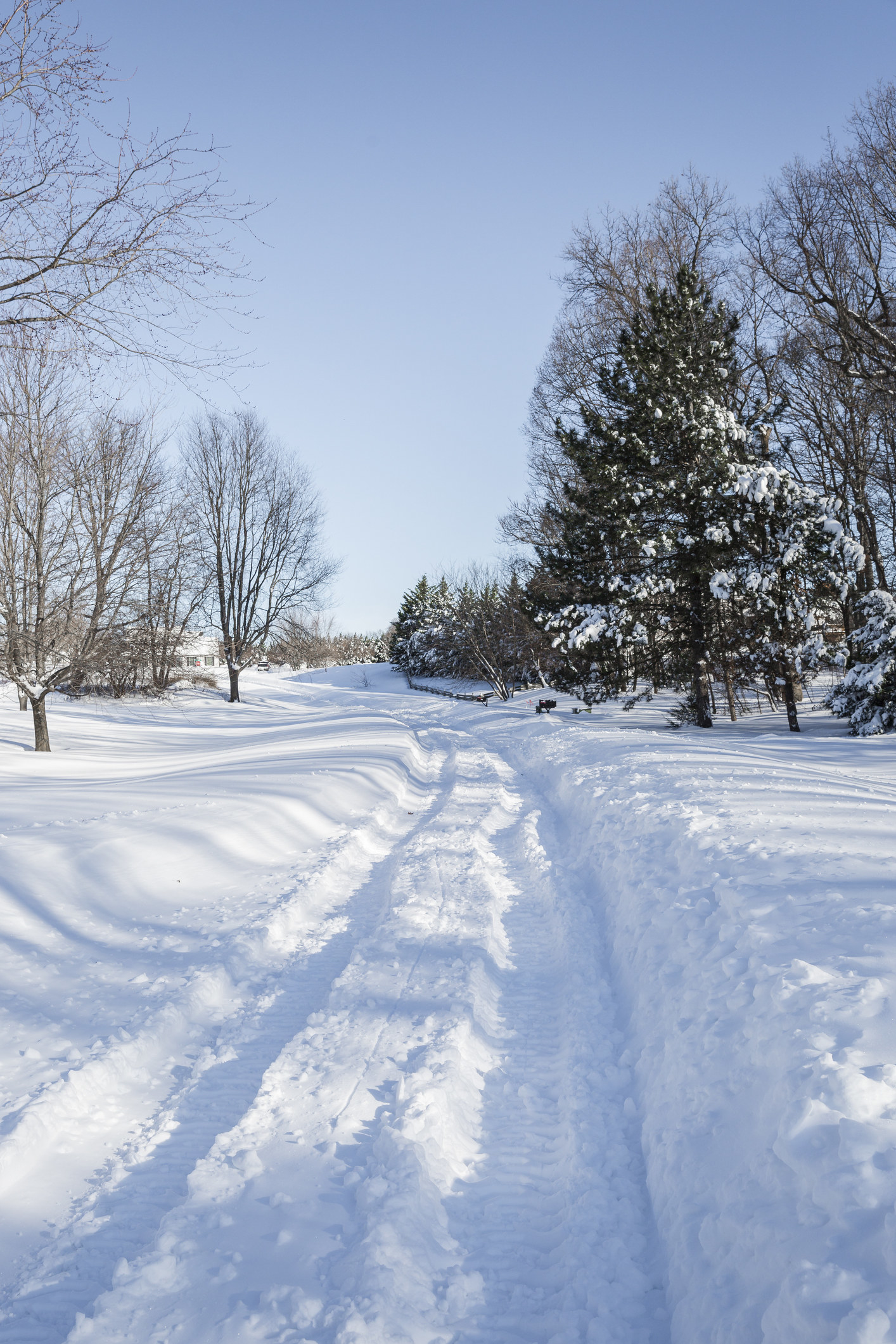 A rural road covered in snow