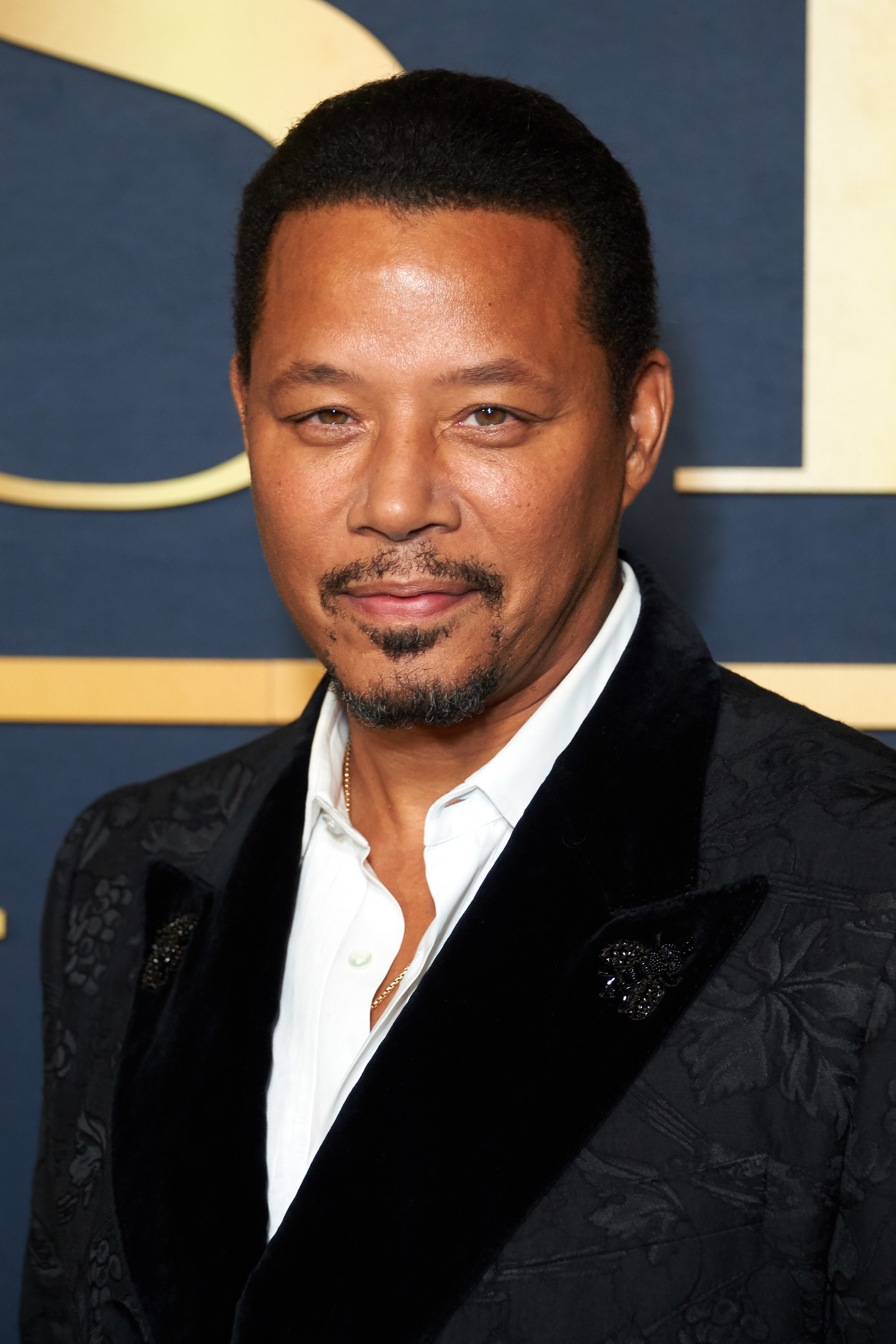 Terrence Howard smiling at a premiere