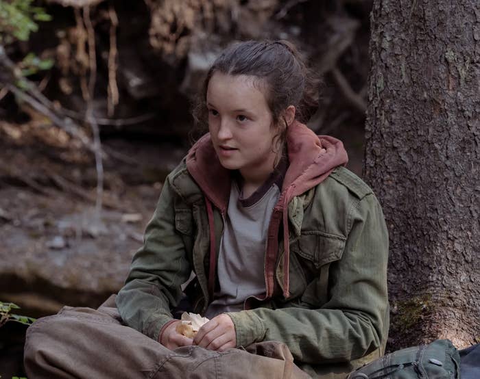 Bella in &quot;The Last of Us,&quot; sitting by a tree