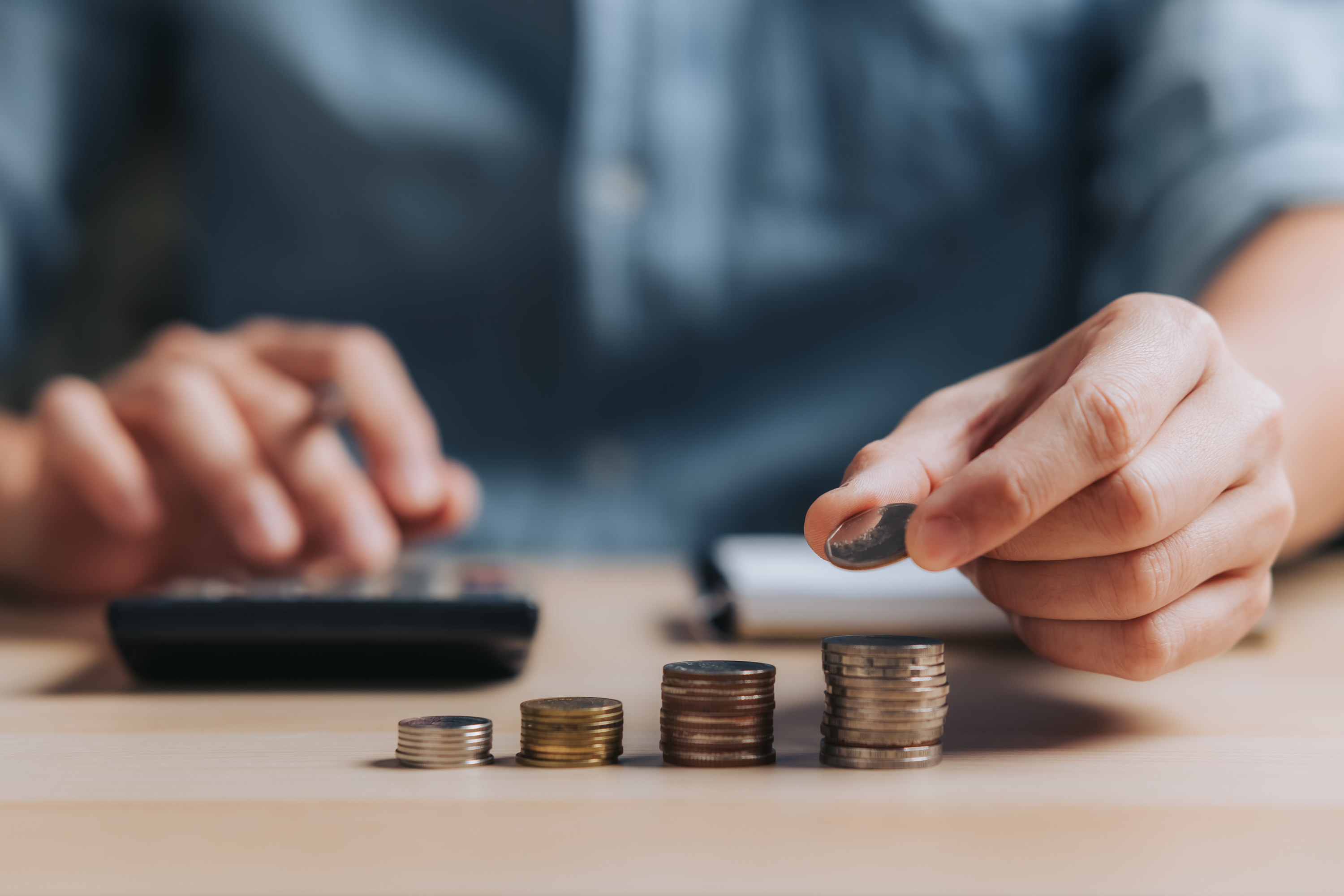 a person counting change