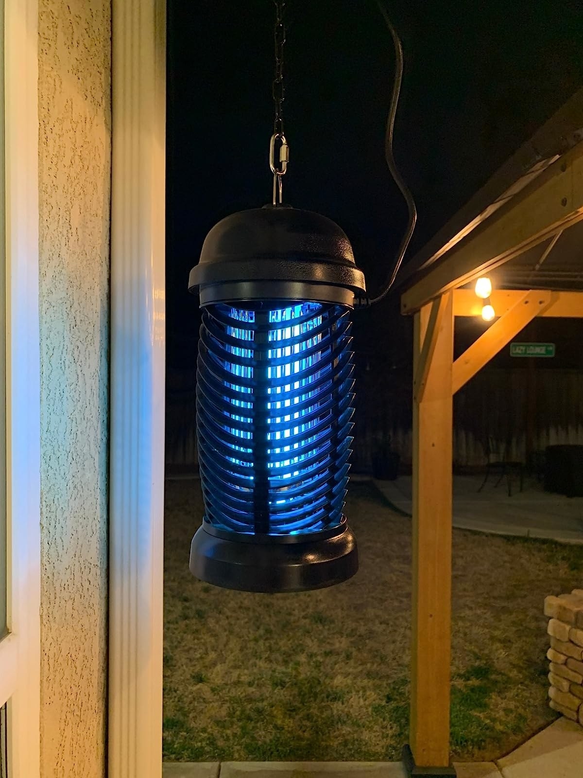 Reviewer image of the bug zapper hanging in their backyard
