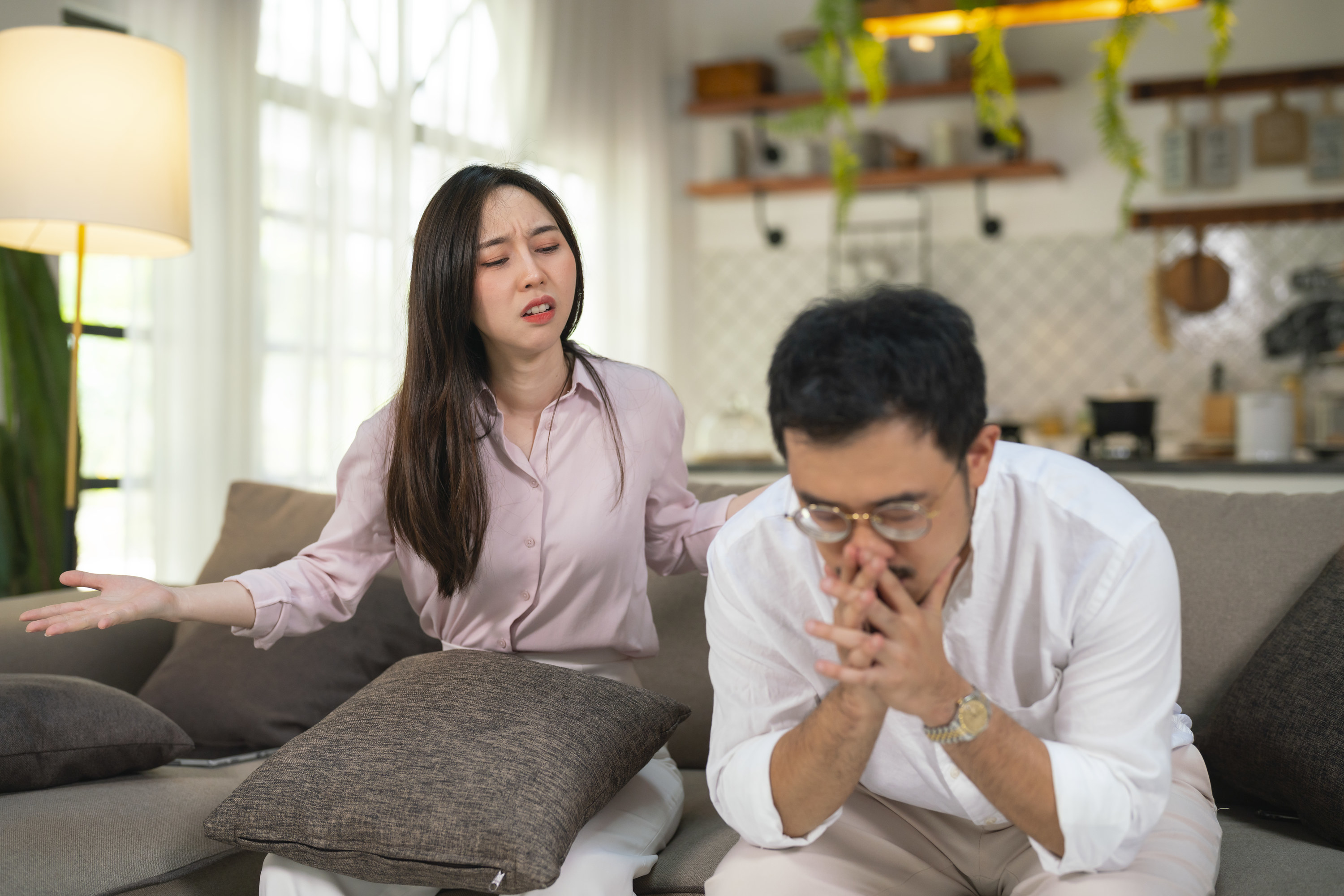 a couple fighting in living room