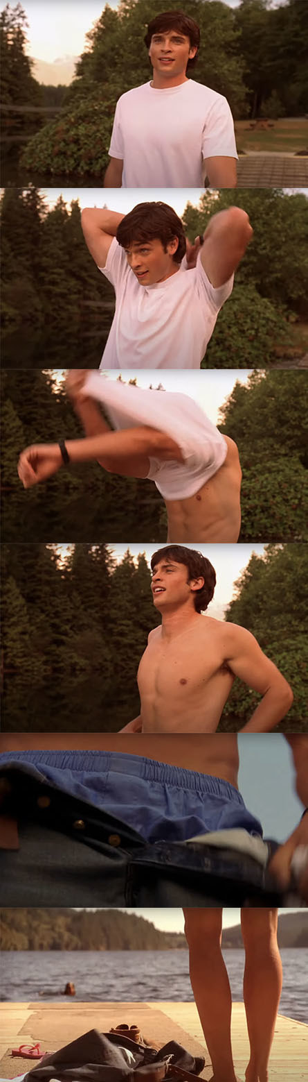 Tom taking off his shirt by the lake