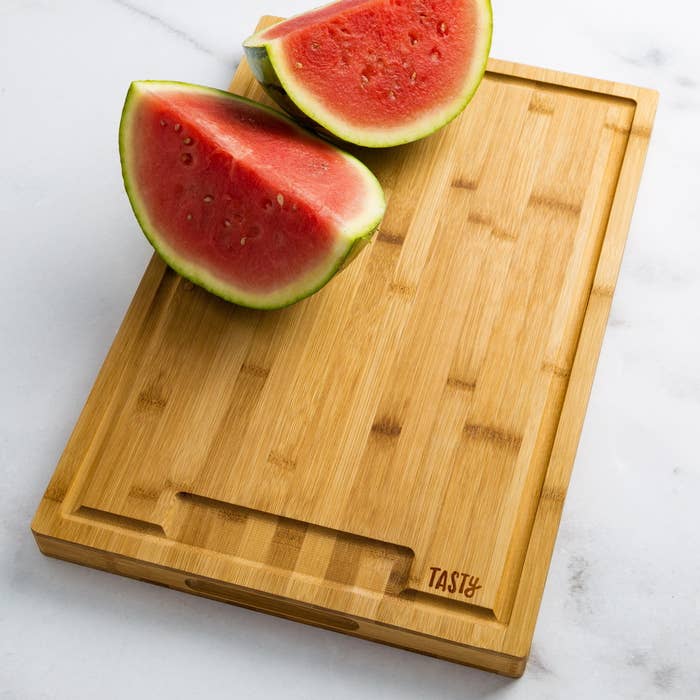 bamboo cutting board with divots for catching juice