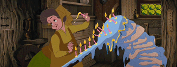 From &quot;Sleeping Beauty&quot;: one of the fairies places candles on a sagging cake