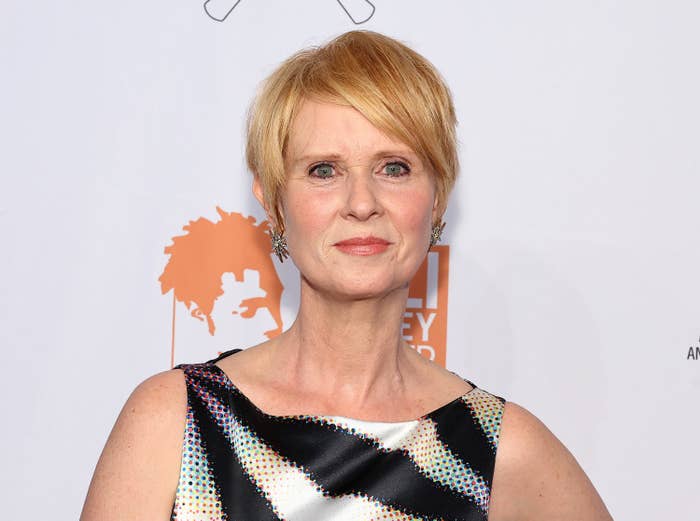 Close-up of Cynthia in a sleeveless outfit