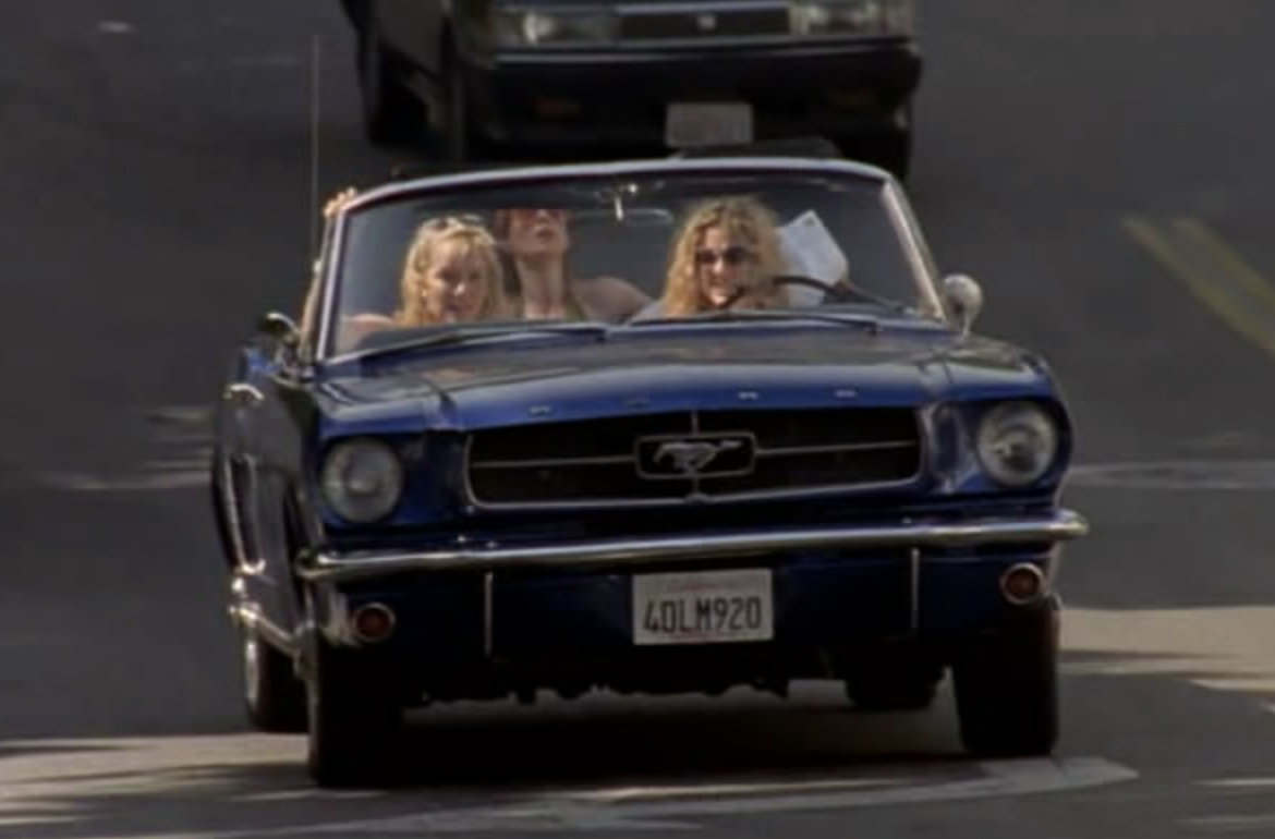 SJP behind the wheel, Kim in the passenger front seat, and Cynthia in the backseat