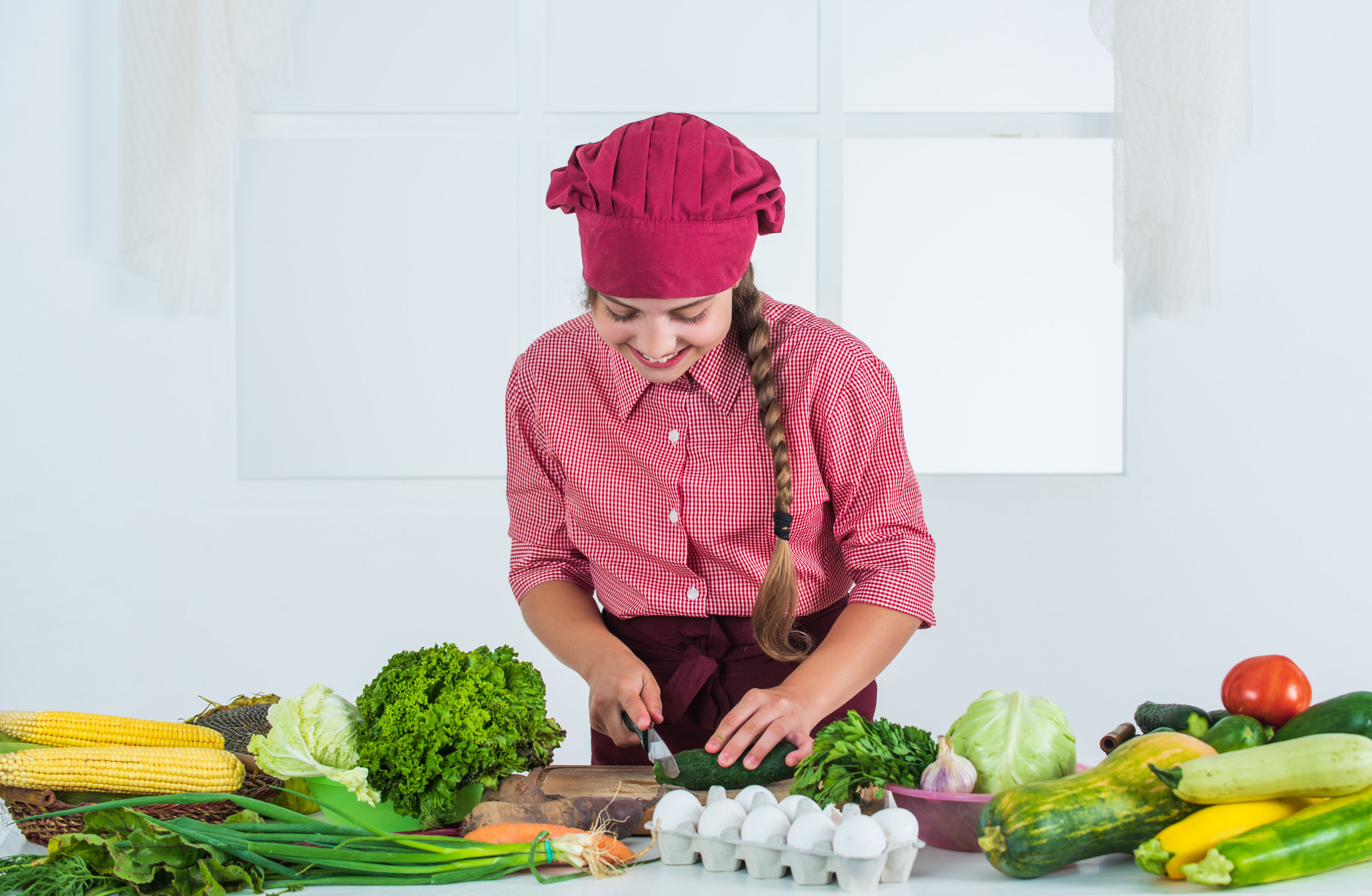A chef cutting veggies