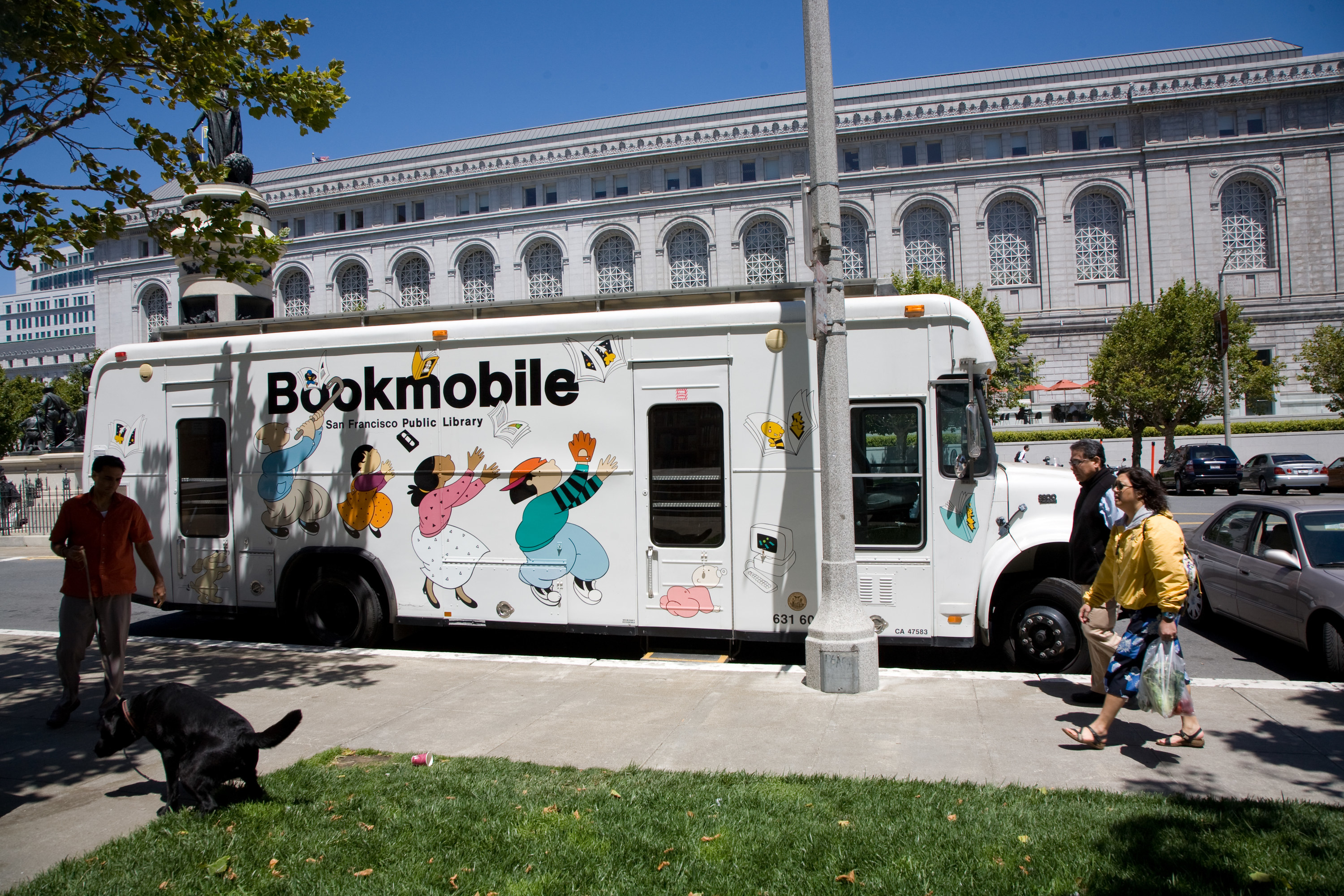 a bookmobile parked on the street